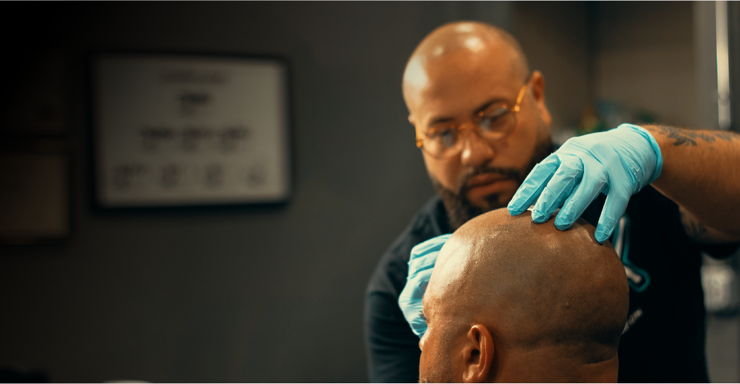 Alex consulting with a client